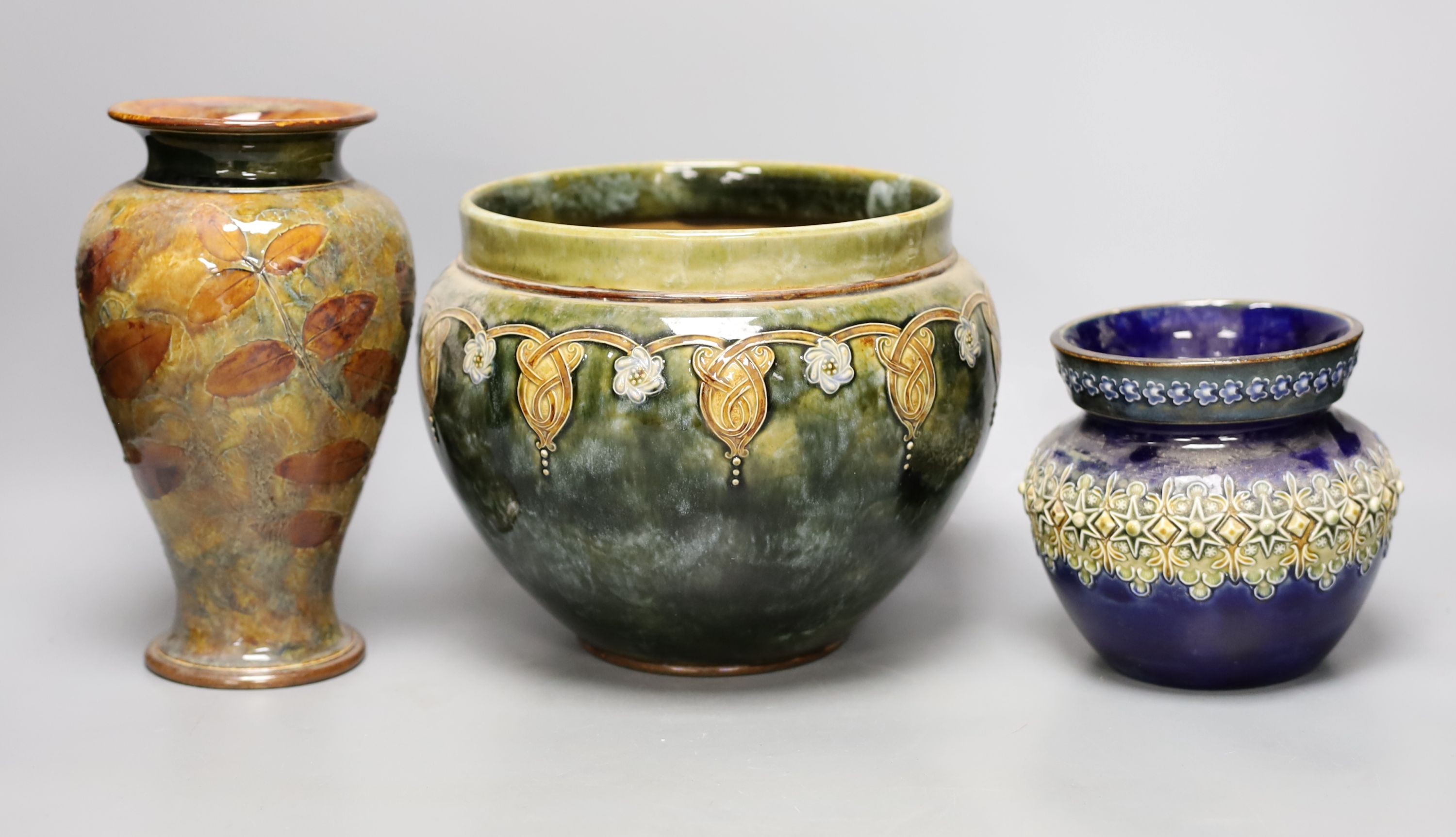 10 pieces of Doulton Lambeth stoneware including a jardiniere, vases etc, largest item jardiniere, 19 cms diameter.